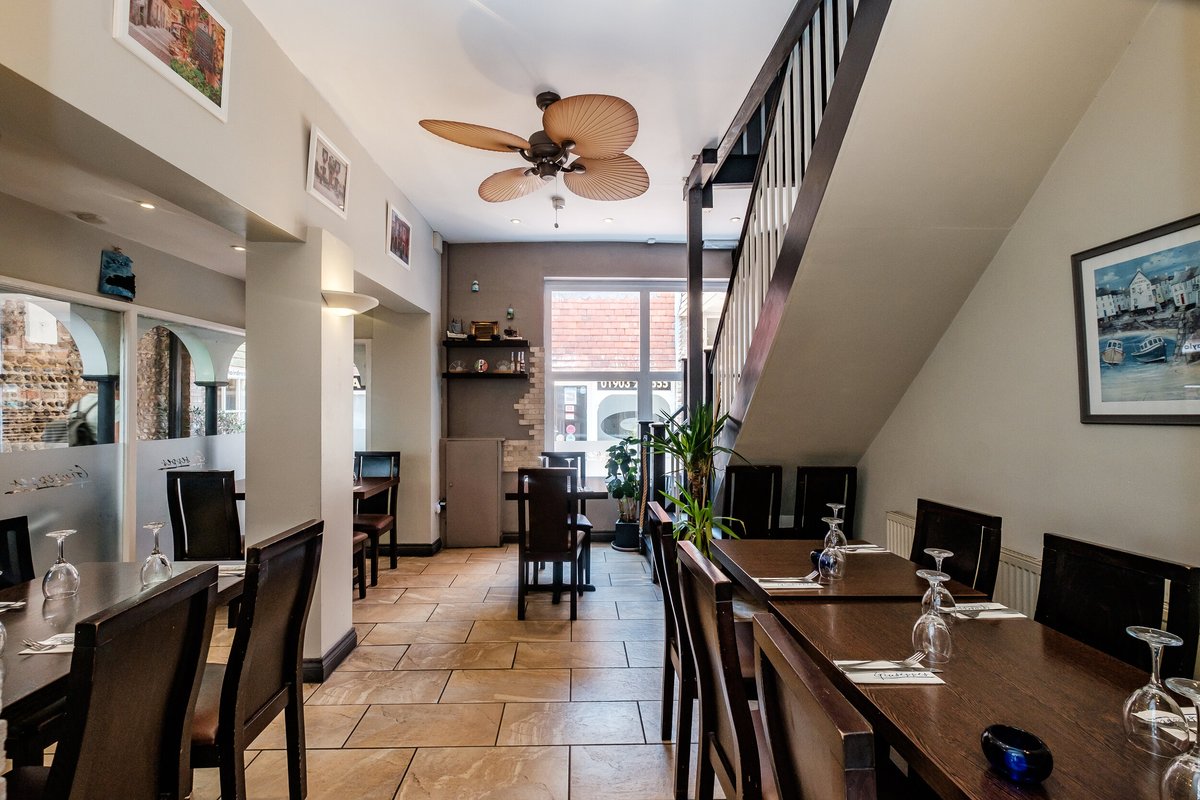 Dining tables under the staircase